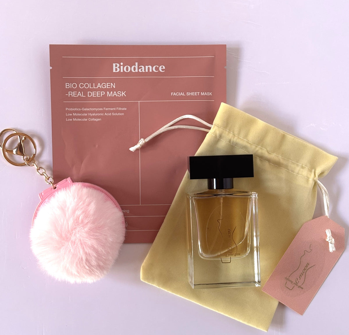 sfondo bianco maschera viso biodance portachiavi specchio profumo vaniglia C.Moon 